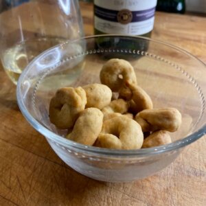 taralli with glass of white wine on the back